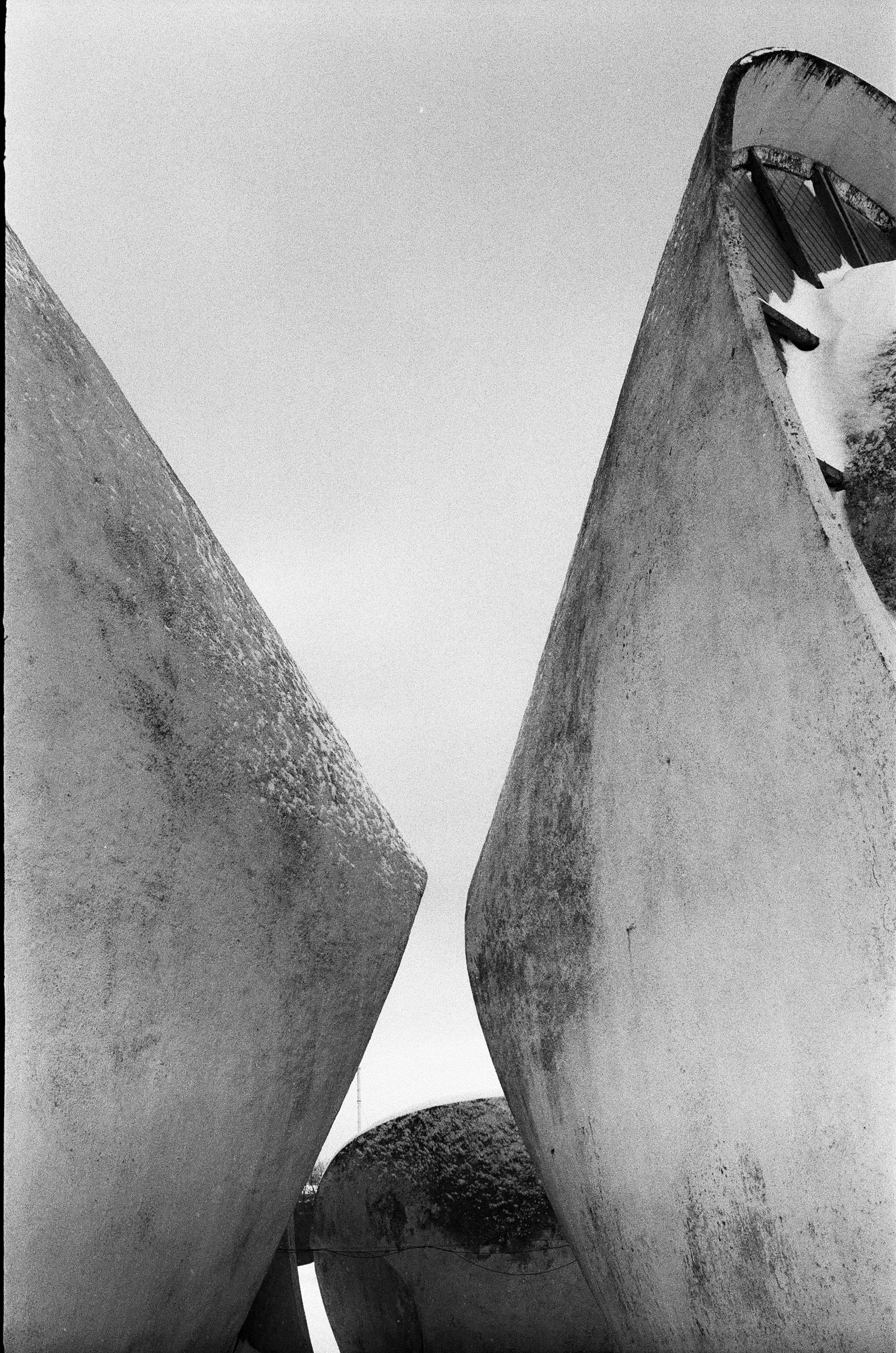 grayscale photo of concrete wall